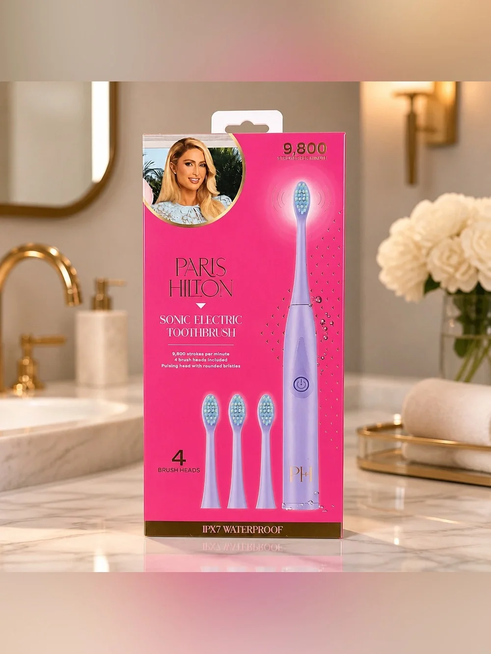 Paris Hilton Pink Toothbrush Set with 4 Brush Heads
